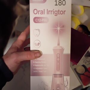 Oral Irrigator with Multiple Cleaning Modes - Pink